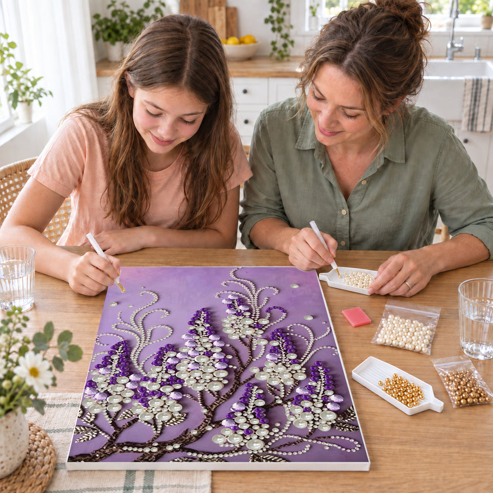 Mother and daughter creating one shared Pearl artwork — Cascading Purple Blossoms and Pearl Strands. Pearl diamond painting DIY kit by Isuvio.