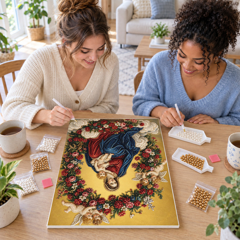 Two friends creating one shared Pearl artwork — Madonna and Child in a Rose Wreath. Pearl diamond painting DIY kit by Isuvio.