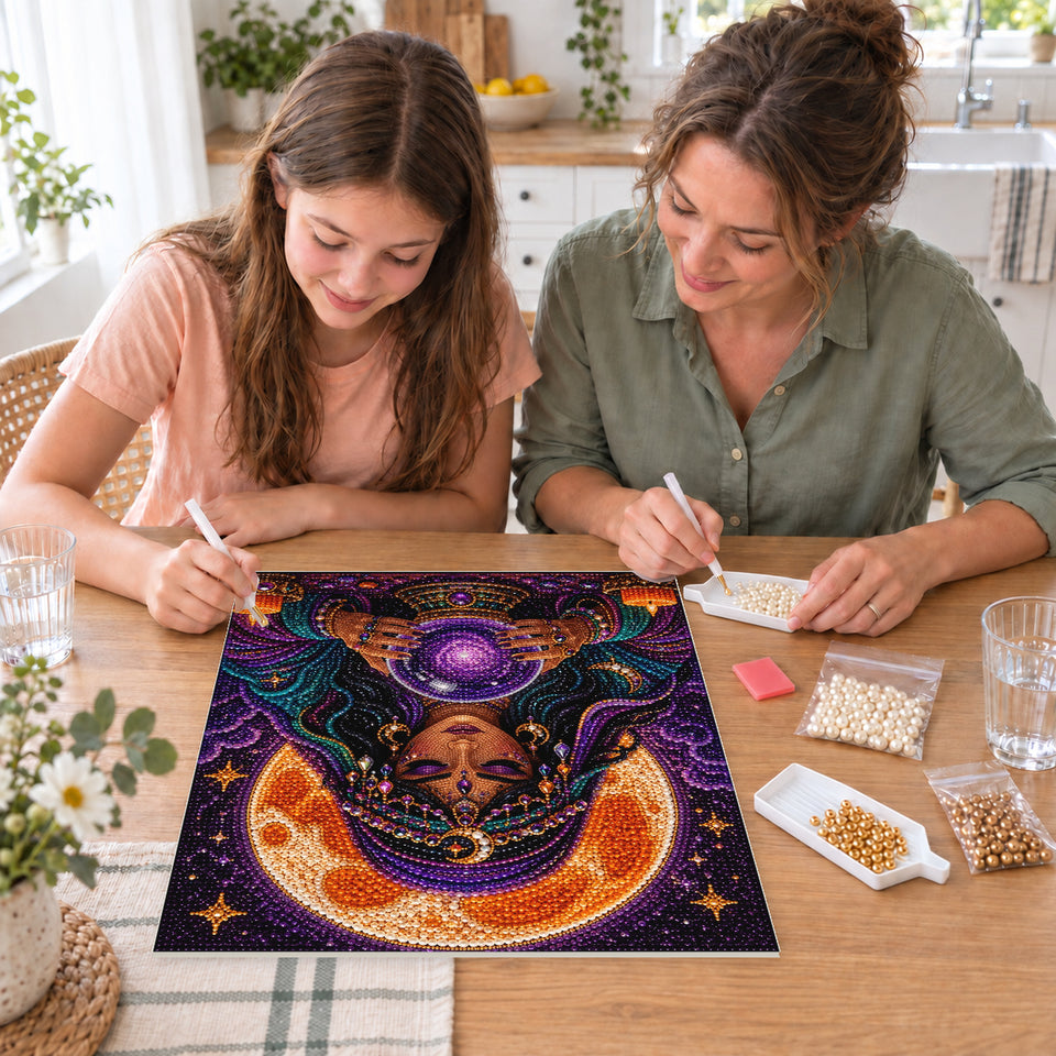 Mother and daughter creating one shared Pearl artwork — Fortune Teller Gazing into a Purple Crystal Ball. Pearl diamond painting DIY kit by Isuvio.