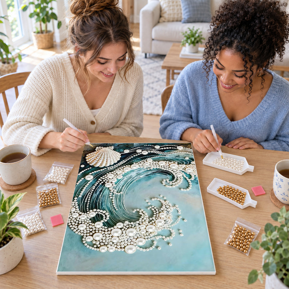 Two friends creating one shared Pearl artwork — Turquoise Ocean Wave with White Pearl Foam. Pearl diamond painting DIY kit by Isuvio.