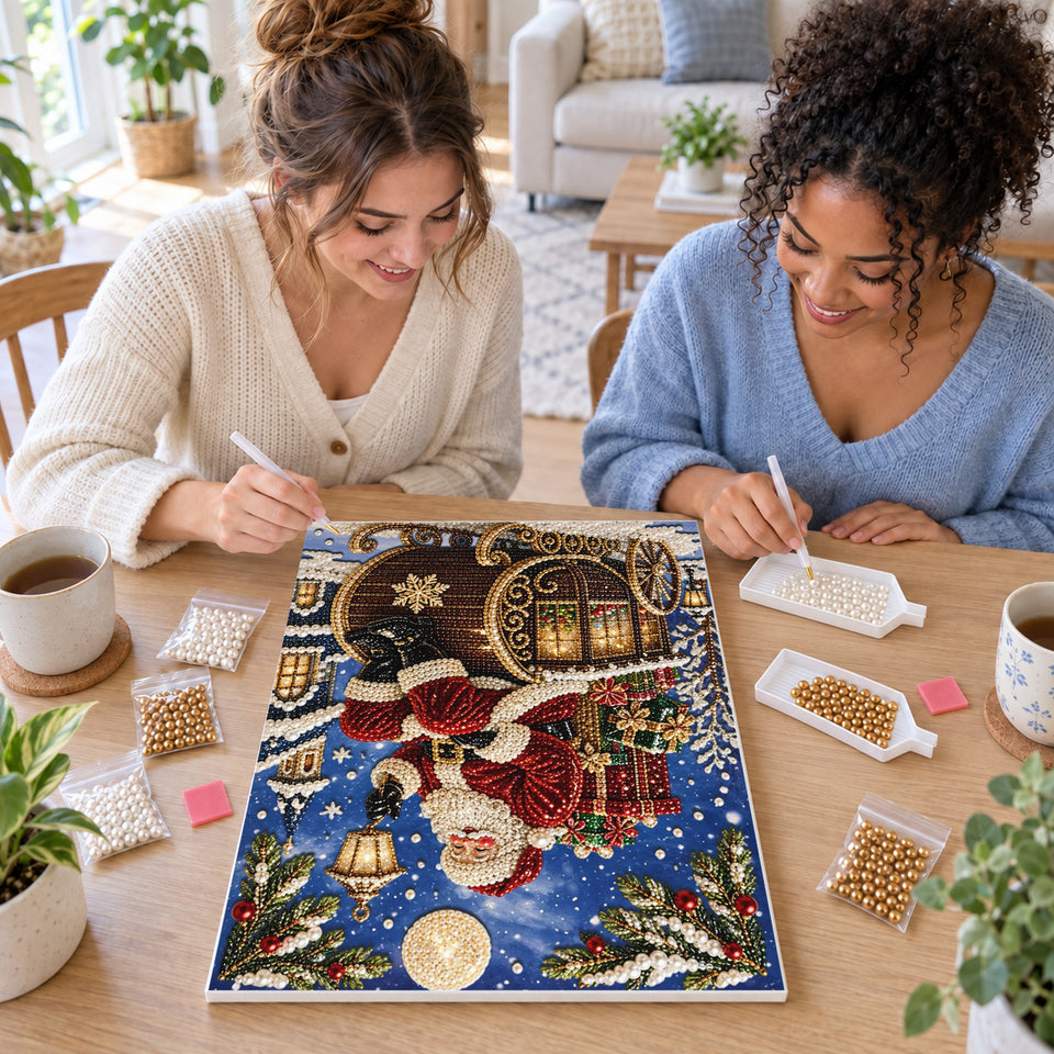 Two friends creating one shared Pearl artwork — Moonlit Santa Gift Sleigh. Pearl diamond painting DIY kit by Isuvio.