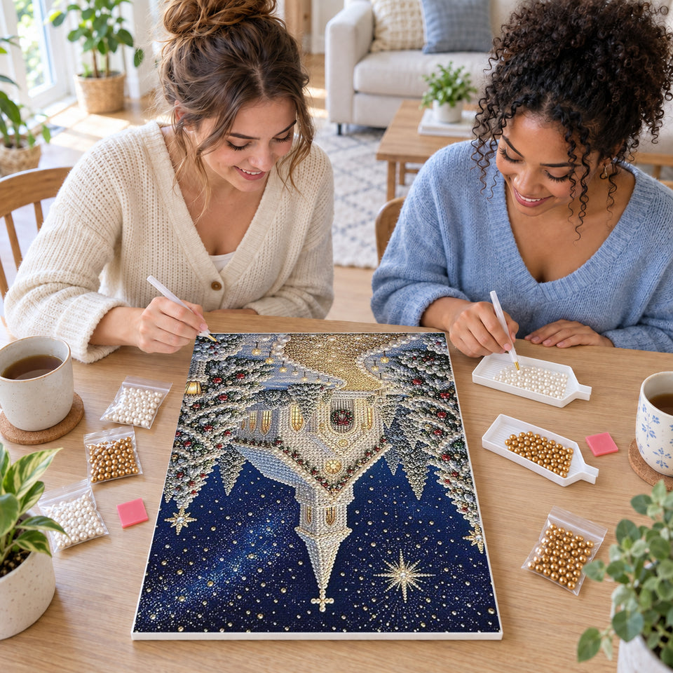 Two friends creating one shared Pearl artwork — Snowy Christmas Chapel Under the Stars. Pearl diamond painting DIY kit by Isuvio.
