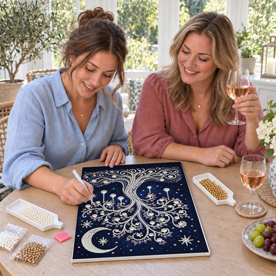 Friends enjoying a sip and craft session — Pearl Tree Beneath a Crescent Moon and Stars. Pearl diamond painting DIY kit by Isuvio.