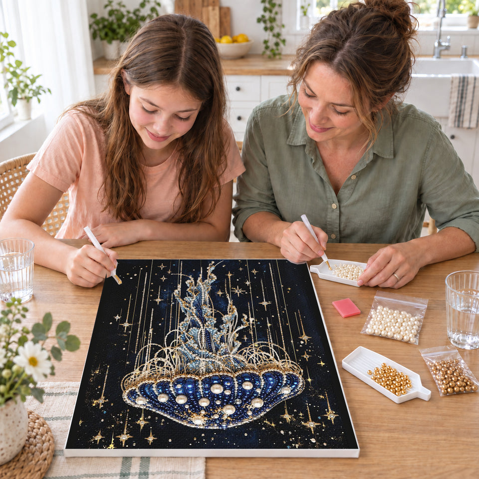 Mother and daughter creating one shared Pearl artwork — Blue Jellyfish Beneath Golden Stars. Pearl diamond painting DIY kit by Isuvio.
