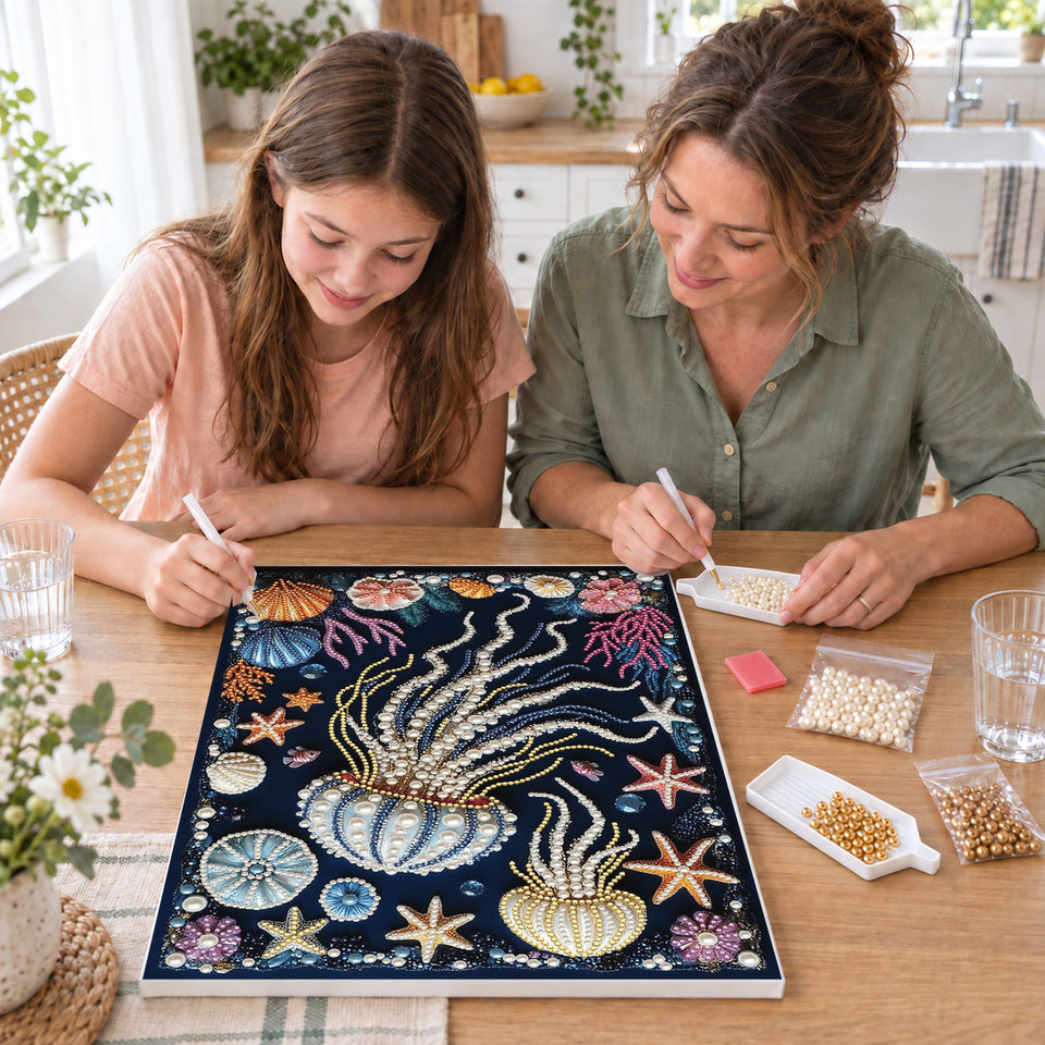Mother and daughter creating one shared Pearl artwork — Pearl Jellyfish with Colorful Coral and Seashells. Pearl diamond painting DIY kit by Isuvio.