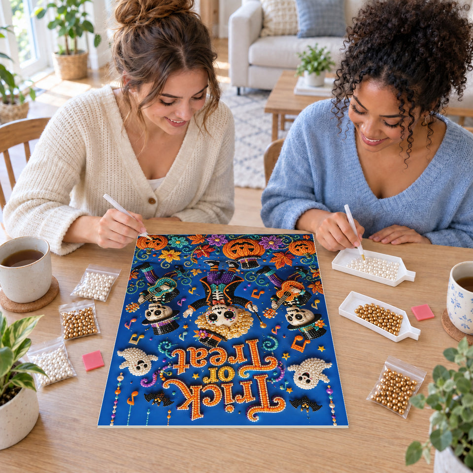 Two friends creating one shared Pearl artwork — Trick or Treat Skeleton Music Trio. Pearl diamond painting DIY kit by Isuvio.