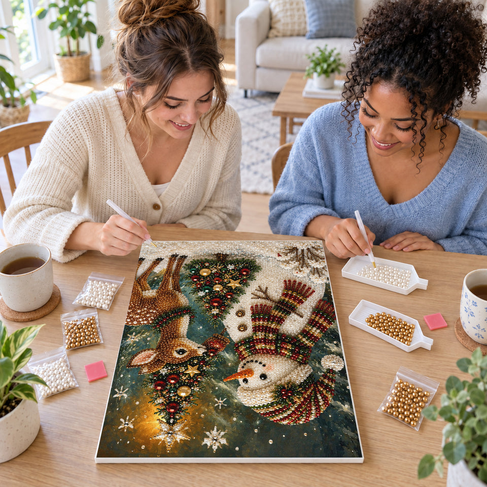 Two friends creating one shared Pearl artwork — Snowman and Reindeer Christmas Friends. Pearl diamond painting DIY kit by Isuvio.