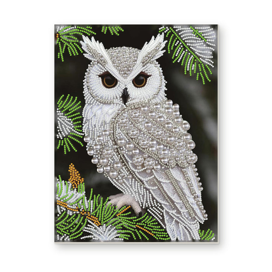 Straight dimensional white-background mockup of the complete artwork — White Owl Among Evergreen Branches. Pearl diamond painting DIY kit by Isuvio.