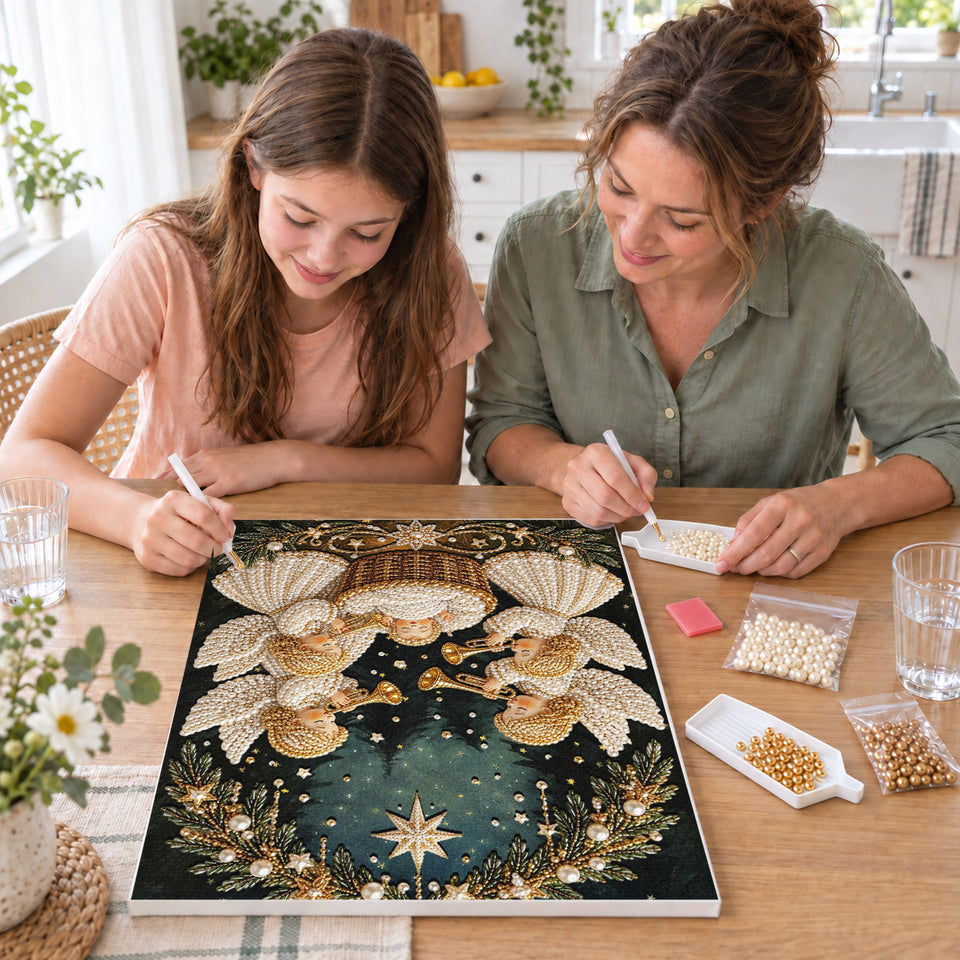 Mother and daughter creating one shared Pearl artwork — Four Christmas Angels and Baby Jesus. Pearl diamond painting DIY kit by Isuvio.