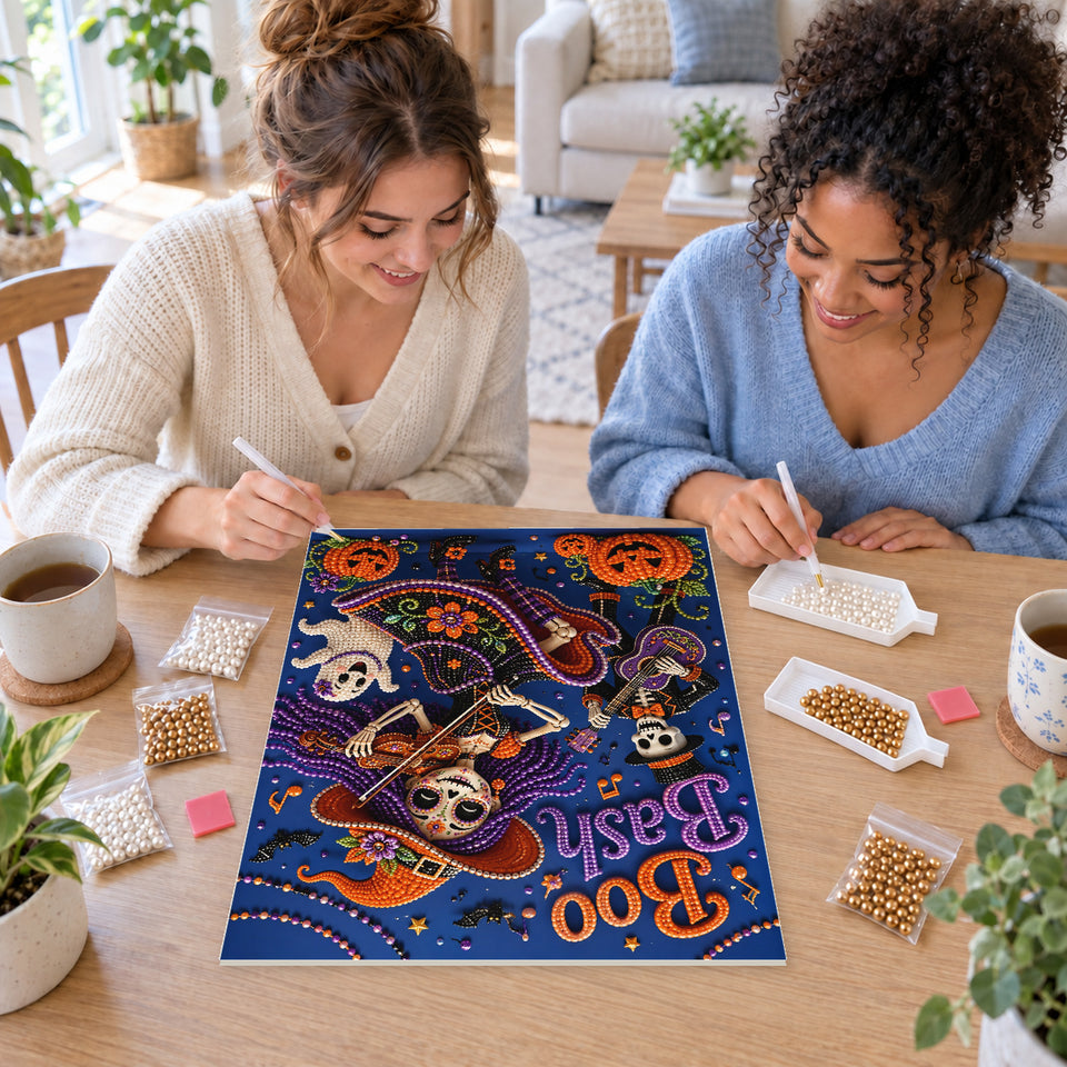 Two friends creating one shared Pearl artwork — Boo Bash Skeleton Violinist. Pearl diamond painting DIY kit by Isuvio.