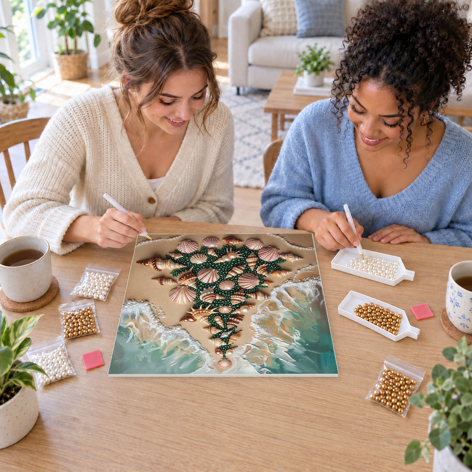 Two friends creating one shared Pearl artwork — Seashell Christmas Tree by the Ocean. Pearl diamond painting DIY kit by Isuvio.