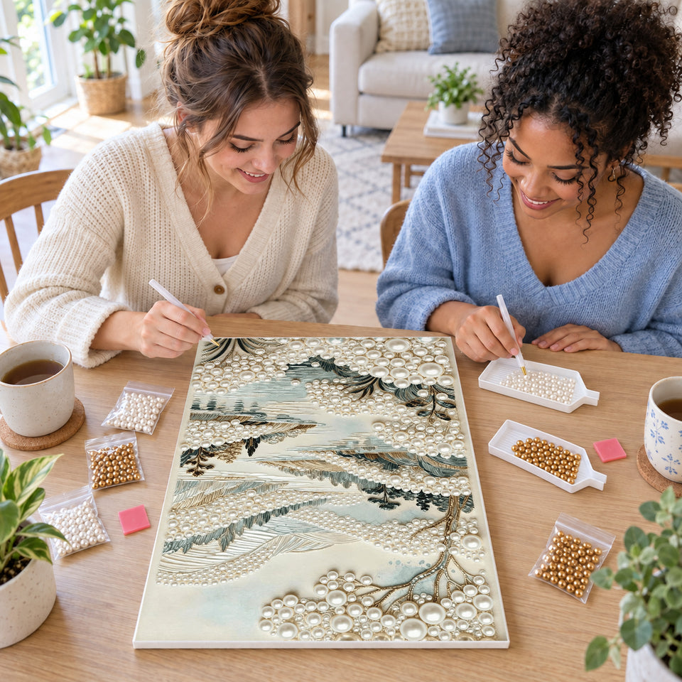 Two friends creating one shared Pearl artwork — Quiet River Through Pearl-White Hills. Pearl diamond painting DIY kit by Isuvio.
