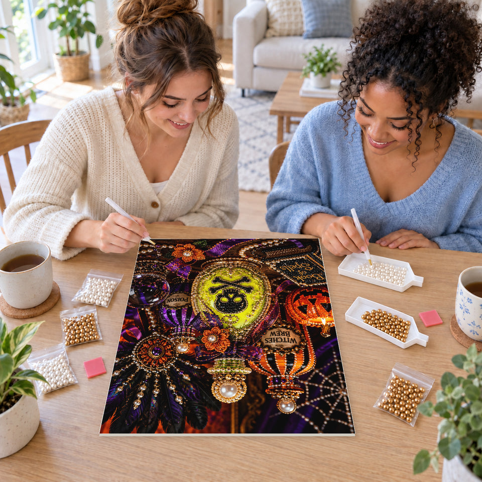 Two friends creating one shared Pearl artwork — Witch's Potions and a Book of Spells. Pearl diamond painting DIY kit by Isuvio.