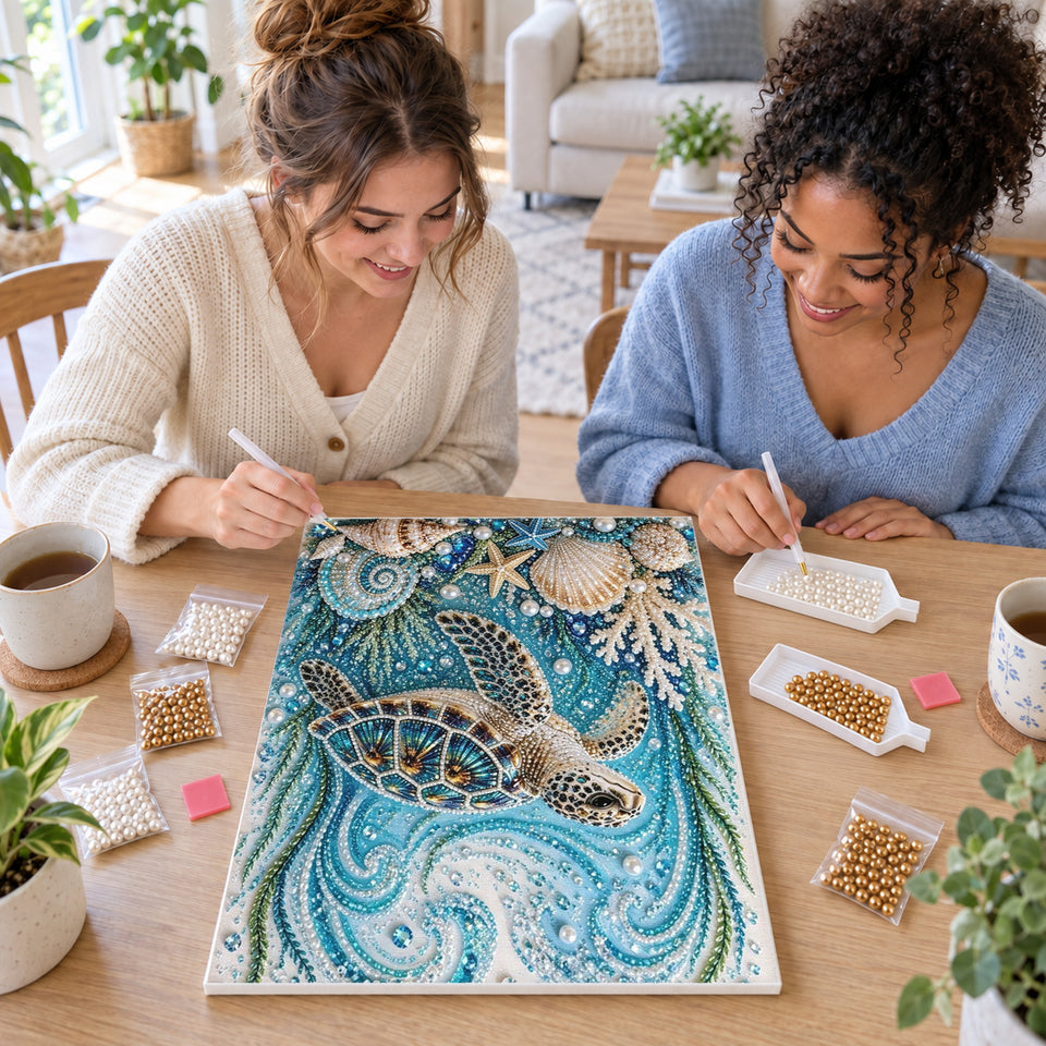 Two friends creating one shared Pearl artwork — Sea Turtle Among Turquoise Waves and Seashells. Pearl diamond painting DIY kit by Isuvio.