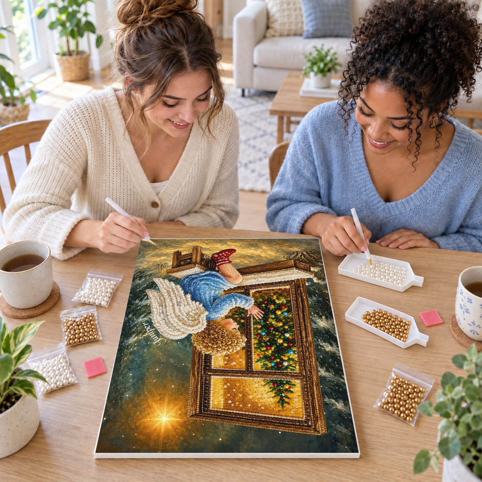 Two friends creating one shared Pearl artwork — Little Angel Watching a Christmas Tree Through a Window. Pearl diamond painting DIY kit by Isuvio.