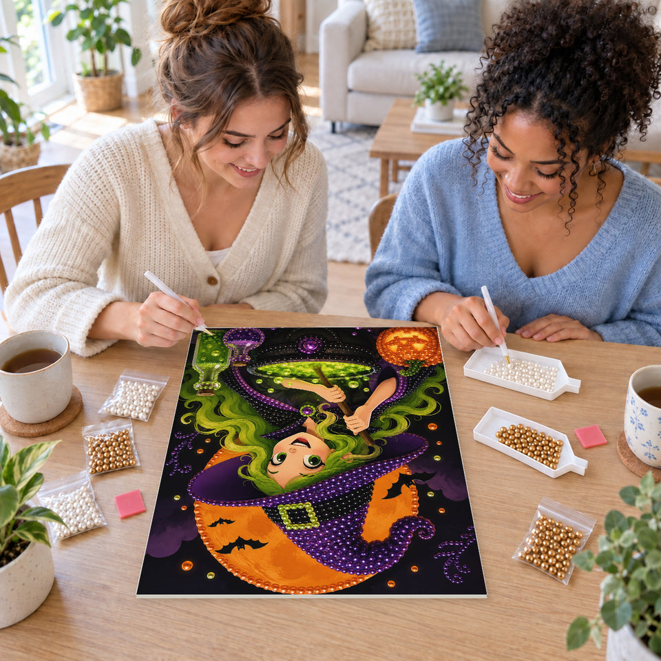 Two friends creating one shared Pearl artwork — Green-Haired Witch Stirring a Cauldron. Pearl diamond painting DIY kit by Isuvio.