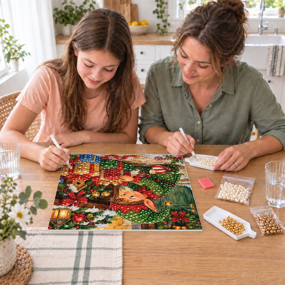 Mother and daughter creating one shared Pearl artwork — Christmas Elf Wrapping a Red Present. Pearl diamond painting DIY kit by Isuvio.
