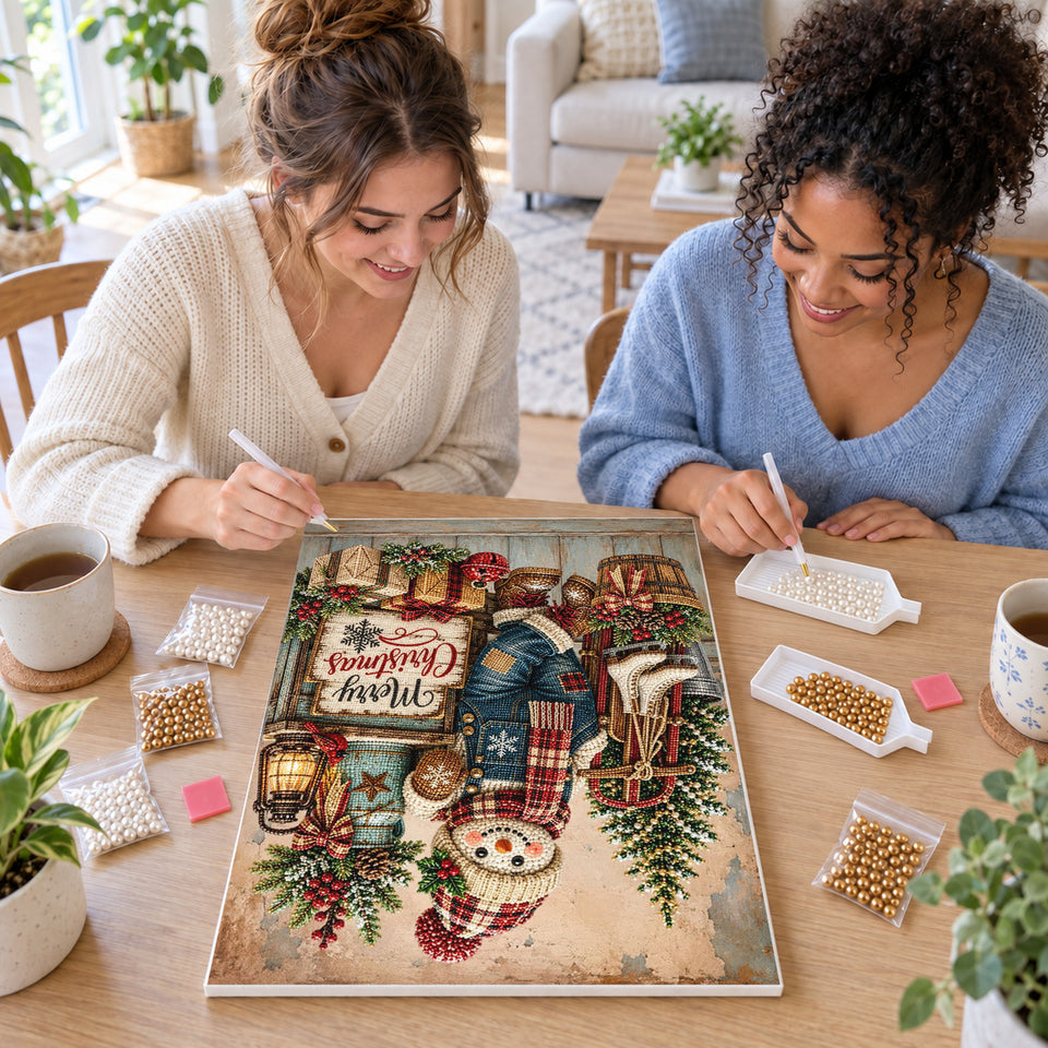 Two friends creating one shared Pearl artwork — Snowman with Skates and a Christmas Sign. Pearl diamond painting DIY kit by Isuvio.