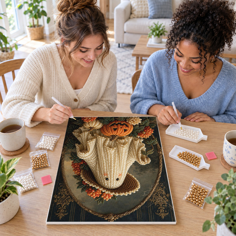 Two friends creating one shared Pearl artwork — Harvest Ghost in a Flowered Straw Hat. Pearl diamond painting DIY kit by Isuvio.