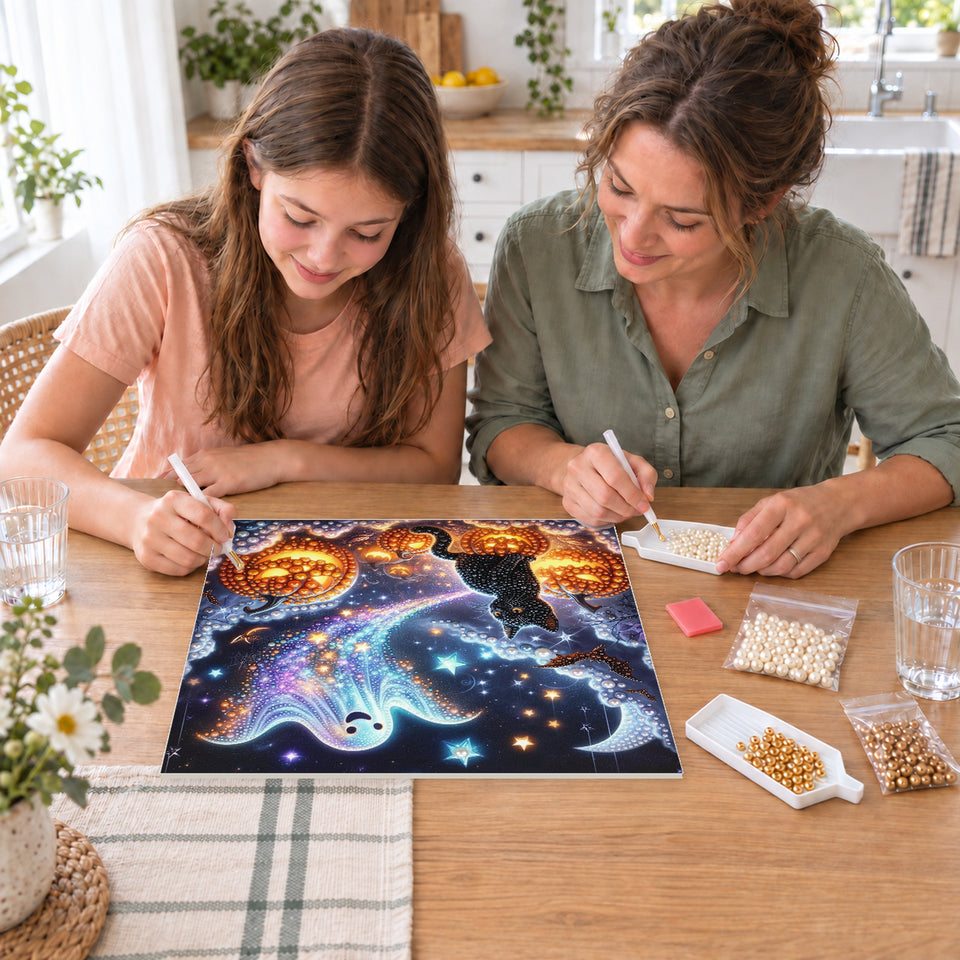 Mother and daughter creating one shared Pearl artwork — Rainbow Ghost with a Black Cat and Jack-o'-Lanterns. Pearl diamond painting DIY kit by Isuvio.